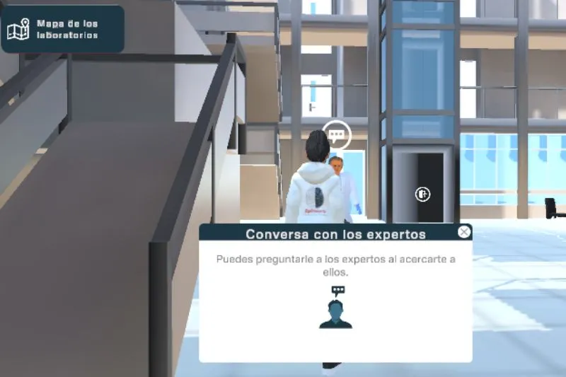 Virtual lab building interior with a user in a white hoodie approaching an expert chat prompt in Spanish: 'Conversa con los expertos'
