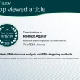 Award badge and header reading 'Top viewed article' for Rodrigo Aguilar in The FEBS Journal, RNA structure analysis guide.